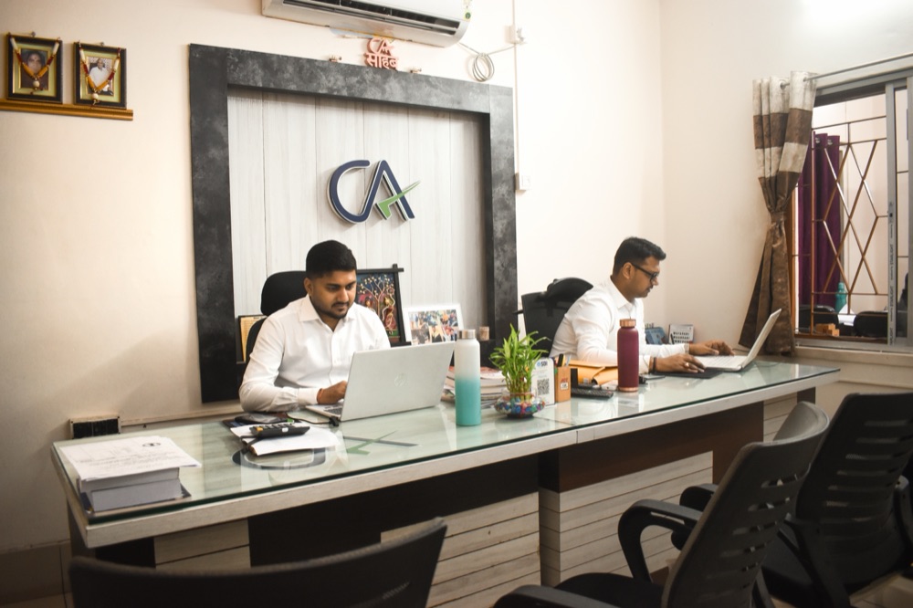 Partners at work in the R K A A & Associates office